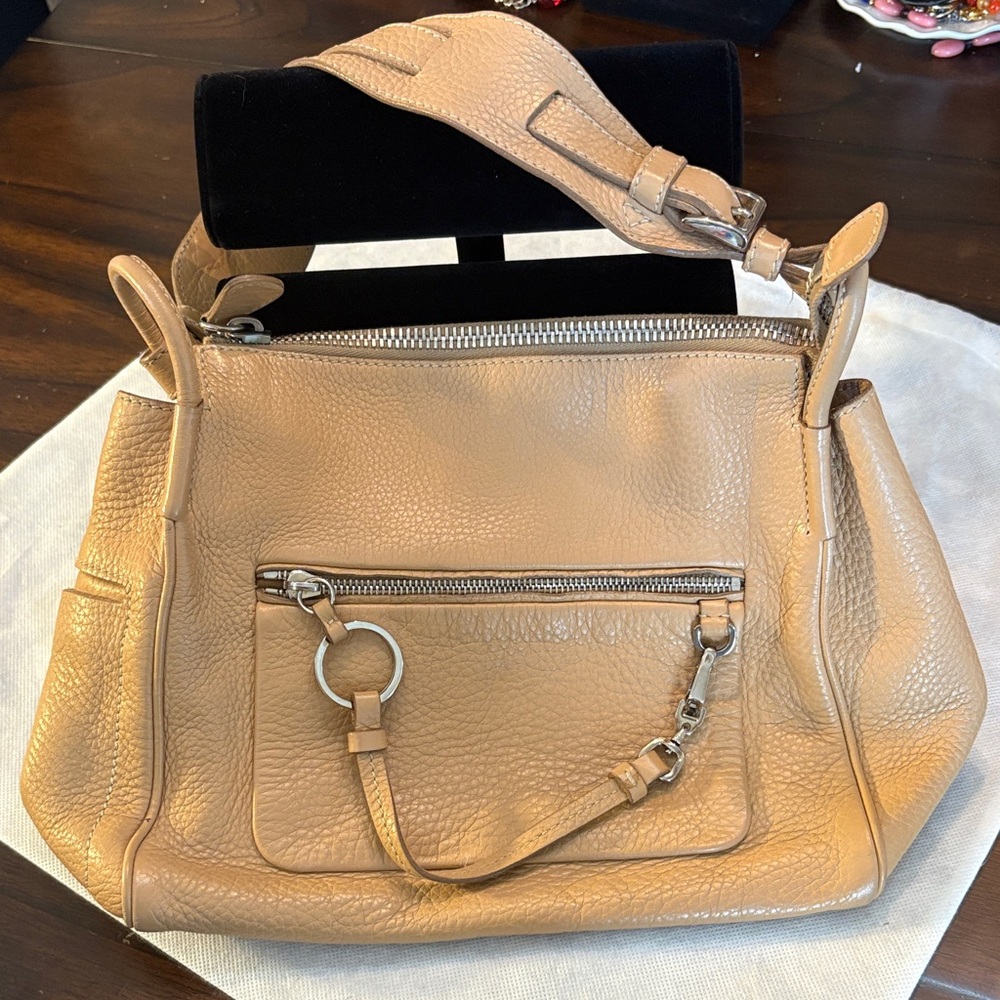 Prada Pebbled Leather Zip pocket front top zip wide strap shoulder Bag